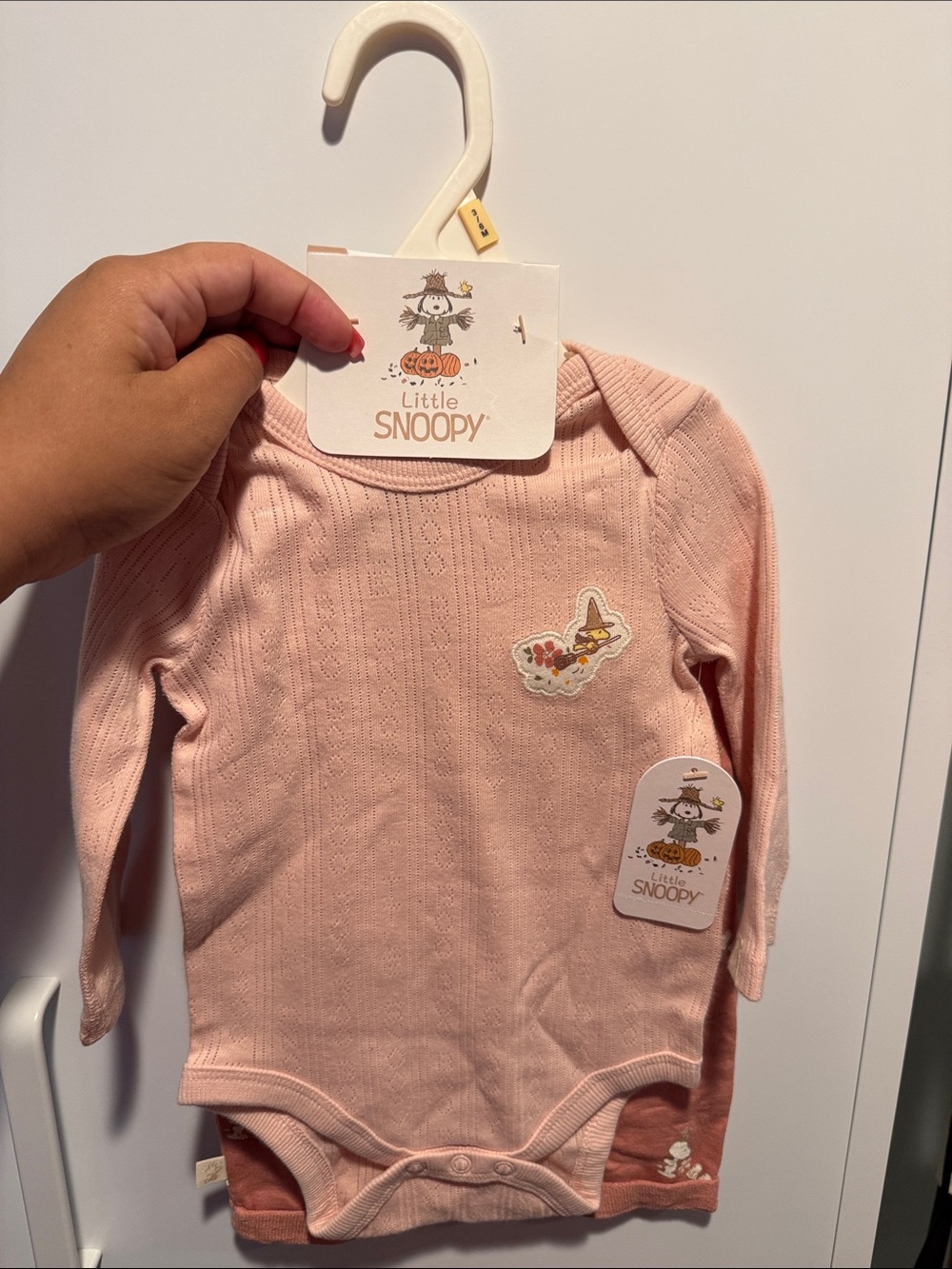 Snoopy baby girl onesie + matching hats 
3-6 months